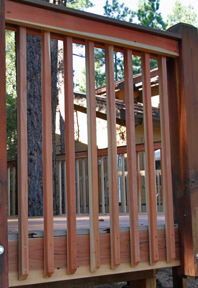 Redwood hand rail on a Trex deck
