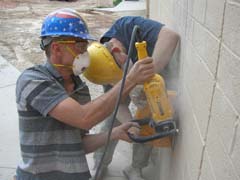 Cutting cinder block wall