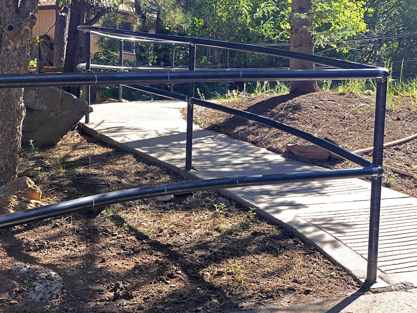 Welded metal handrail for ADA access.