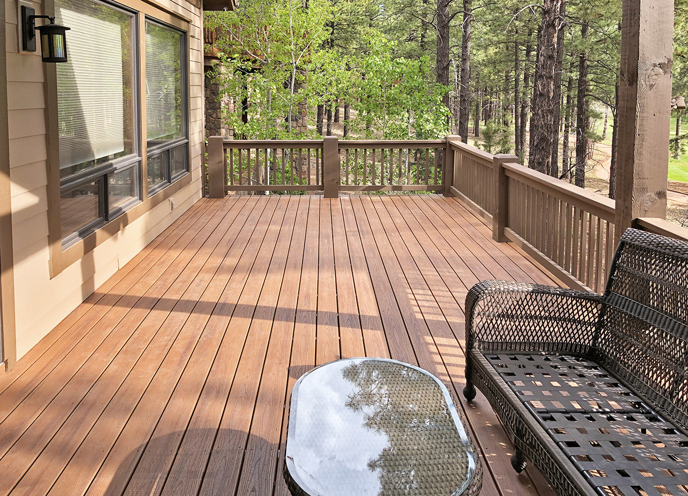Trex Transcends decking with wood handrails made from 8x8 posts