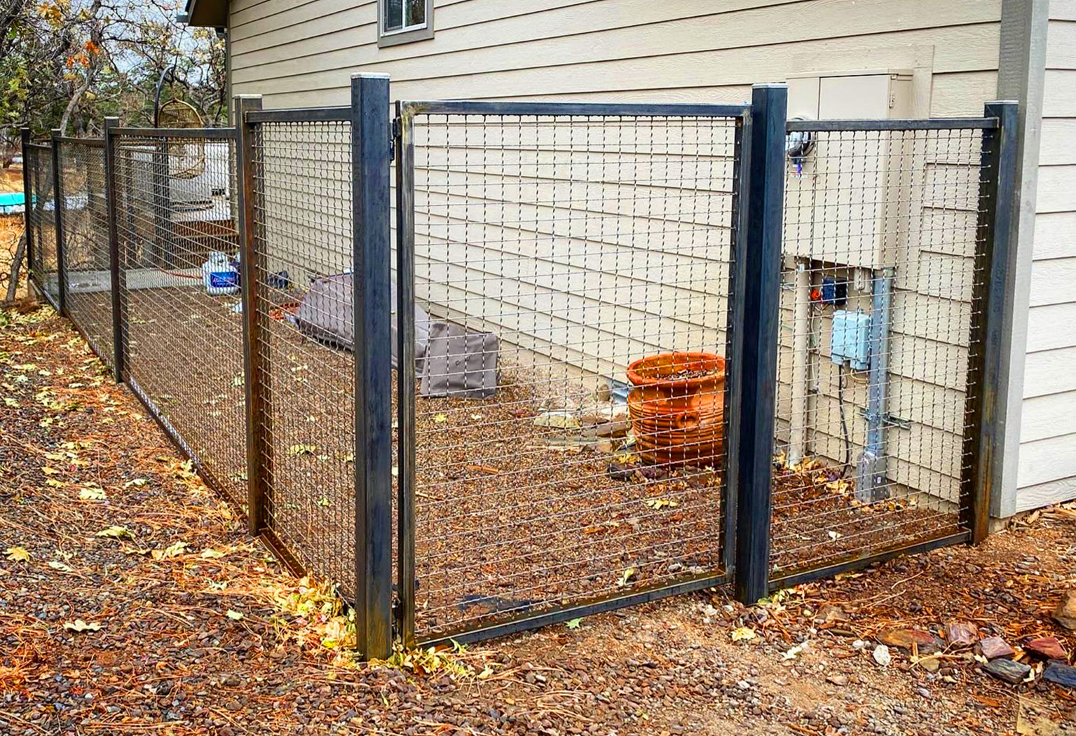 A custom welded garden fence in Flagstaff AZ