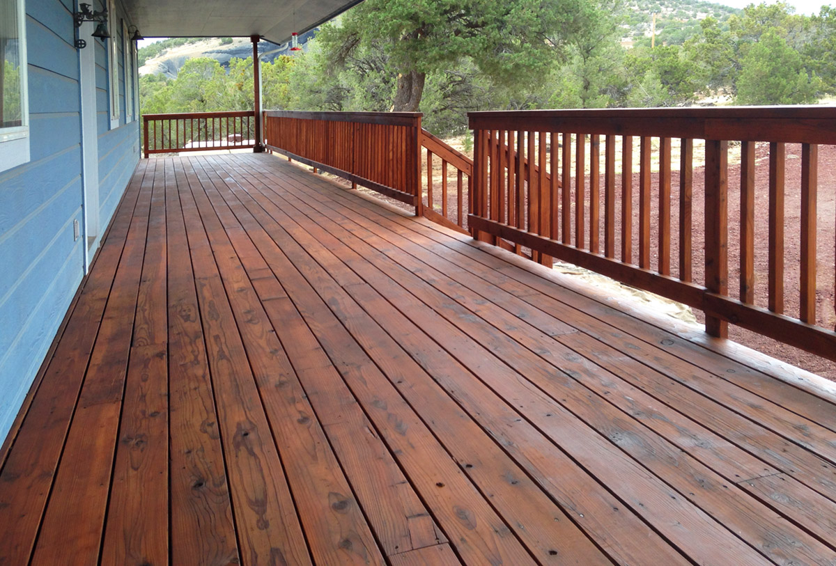Re-staining a redwood deck and railing.