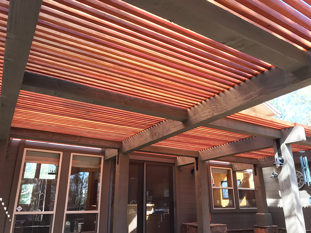 A slatted redwood patio cover in Forest Highlands built by Highwood Construction of Flagstaff AZ