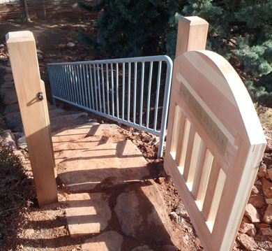Redwood gate with welded iron rail in Sedona