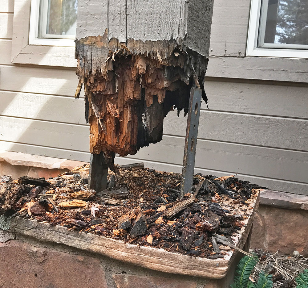Rotted post on a bracket in Forest Highlands